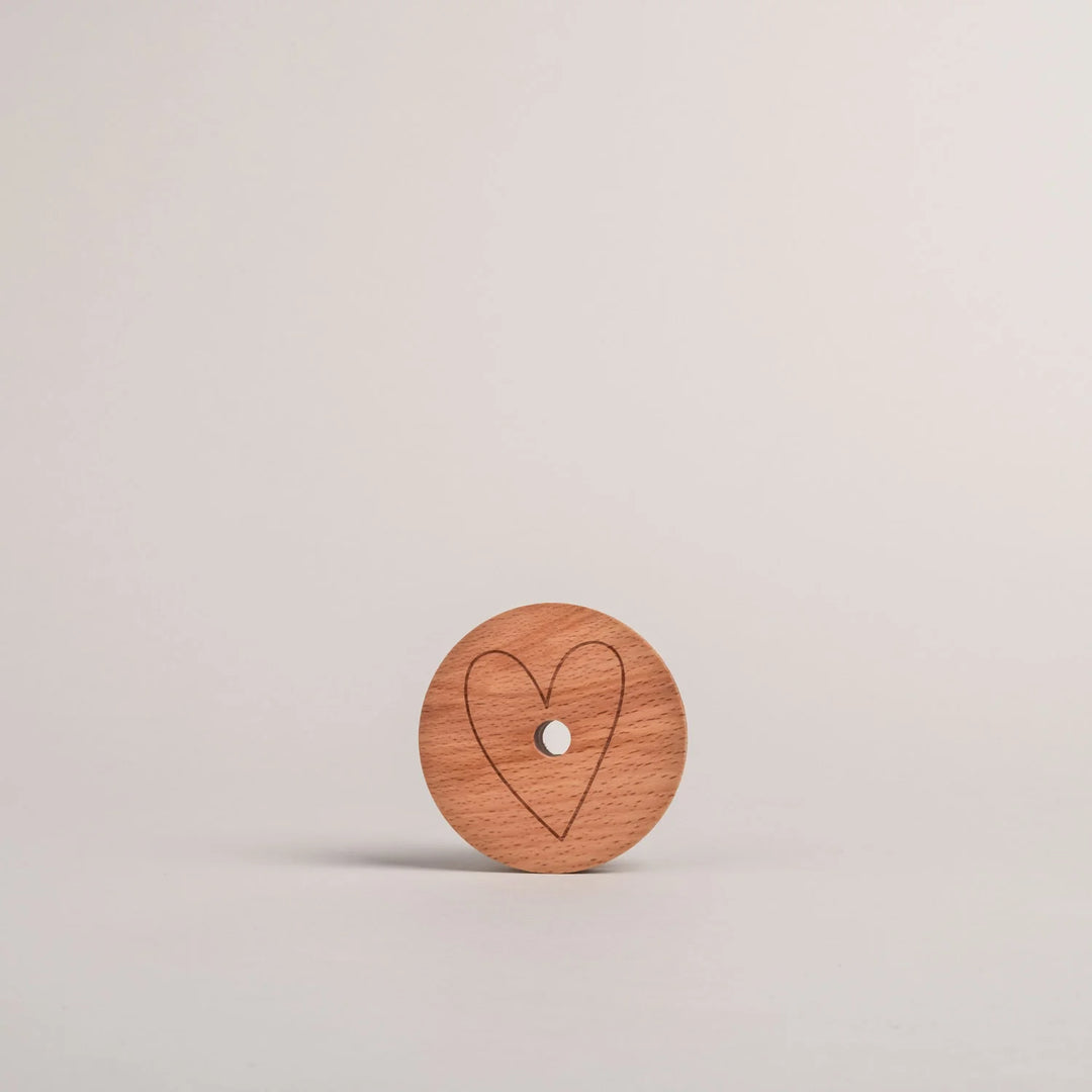Tapa de corazón de madera