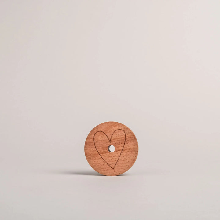 Tapa de corazón de madera